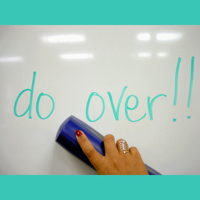 whiteboard with 'do over!' written on it